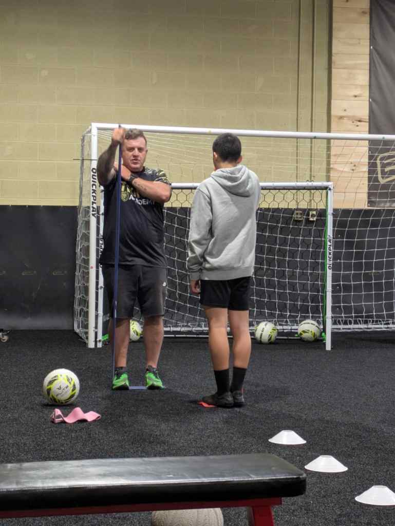 Coach leading 1-on-1 training
